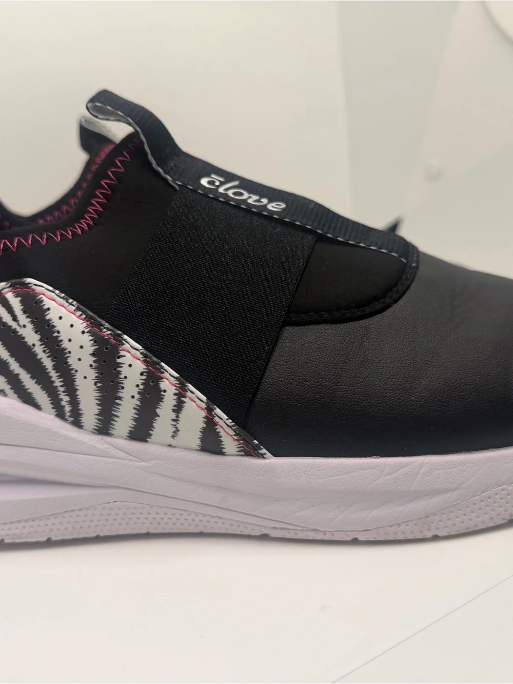 clove Women's Black Slip-On Sneakers with Neon Pink Accents